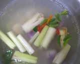 A picture of step 2 of Tom Yum with Red Snapper.
