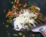 A picture of step 4 of Cheese Maggi stuffed cheese bell pepper.