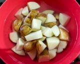 A picture of step 2 of Potato-Brinjal Curry.