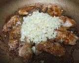A picture of step 2 of Marinated, Pan-Fried, and Braised Onion Pork Ribs with Rice 🍖.