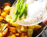 A picture of step 7 of Kumror chokka (Pumpkin & Poteto Sabji).