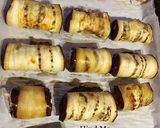 A picture of step 8 of Eggplant Roll-Ups.
