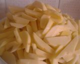 A picture of step 4 of Fried chips with kachumbari.