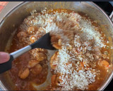 Foto del paso 4 de la receta: Arroz meloso con chipirones y langostinos