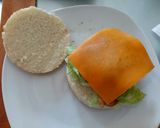 A picture of step 4 of Pork and Apple burger with Cheddar and mustard mayo.
