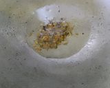 A picture of step 2 of Mula Tomato Khatta.