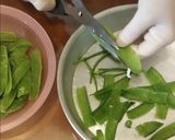 Φωτογραφία βήματος 2 της συνταγής Αγκινάρες με αρακά και κουκιά