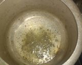 A picture of step 2 of Daliya khichdi with curd,papad and chutney.