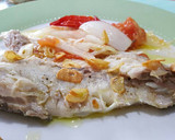 Foto del paso 5 de la receta: Besugo al horno con cebolla y tomate
