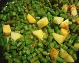 A picture of step 2 of Beans aloo bhaji.