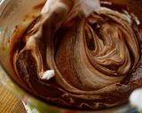 A picture of step 7 of Mini Rich Chocolate Cakes | use 12 cup muffin pan.