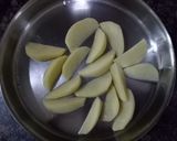 A picture of step 1 of Crispy Potato Wedges.
