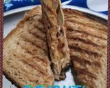 A picture of step 4 of Onion tomato grill sandwhich.