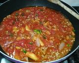 Foto del passaggio 2 della ricetta Tagliatelle verdi con ragù di "galletti" alla bolognese