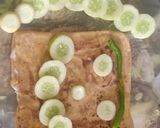 A picture of step 12 of Cheese stuffed paratha with smile emoji.