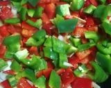 Foto del paso 3 de la receta: Pisto con arroz y huevo frito con "puntilla"