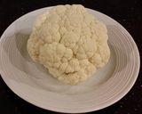 A picture of step 2 of Romano Cheese Crusted Spicy Cauliflower Bites.
