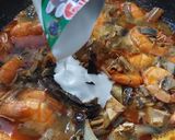 Foto langkah ke 6 dari resep Gulai Udang Jantung Pisang.