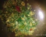 A picture of step 2 of Egg with palak poriyal.