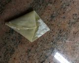 A picture of step 6 of Samosa and a chutney.