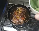 A picture of step 12 of Dahi baingan.