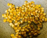 A picture of step 1 of Popcorns tossed with Maggi masala seasoning.