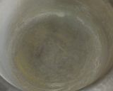 A picture of step 9 of Naked Moist Lemon-banana cake with chocolate chips.