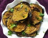 A picture of step 3 of Masala brinjal.