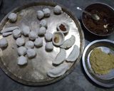 A picture of step 26 of Poush pitha thali.