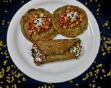 A picture of step 4 of Moong chilla with stuffing.