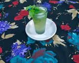 A picture of step 4 of Mousambi Mint Mocktail.