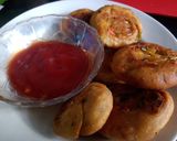 A picture of step 6 of Veg pinwheel tikki roll.