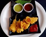 A picture of step 3 of Stuffed bitter gourd na pakoda.