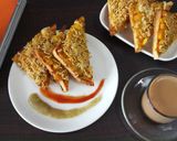 A picture of step 4 of Masala cheese and corn toast.