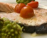 A picture of step 4 of Baked Salmon with Cherry Tomatoes, Garlic, Olive Oil, and Parsley.
