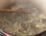 A picture of step 1 of Poached chicken and ginger broth.