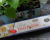 A picture of step 20 of Raisins-Pistachio Baklava.