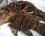 A picture of step 6 of Turmeric fried fish.