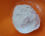A picture of step 4 of Dilkush or sweet bread with coconut and tutti frutti filling.