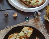 A picture of step 5 of Chessey garlic naan sticks.