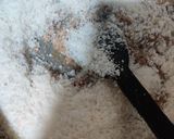 A picture of step 2 of Choco coconut ladoos.