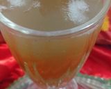 A picture of step 3 of Peach ice tea and coconut water cocktail.