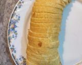 A picture of step 8 of Peach Swiss roll Ice cream Cake.