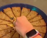 A picture of step 11 of Kibbee Busta (Baked Kibbee with onion and pine nuts).