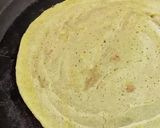 A picture of step 5 of Pesarattu with Coconut Peanut Chutney.