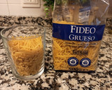 Foto del paso 4 de la receta: Fideos gordos con pollo y calamares