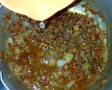 A picture of step 9 of Nigerian carrot fried rice with minced meat soup.