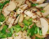 A picture of step 2 of Fry potato capsicum vegetable.