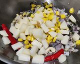 A picture of step 6 of Corn daliya upma.