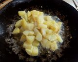 A picture of step 4 of Tawa Bhindi.
